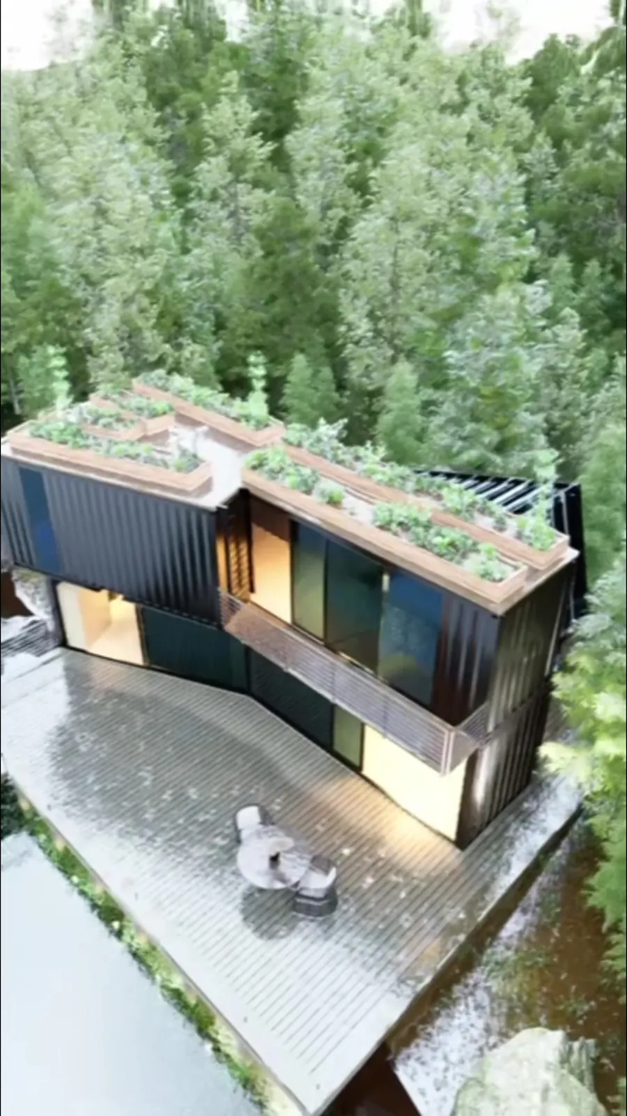 Casa en el lago: vista aérea con la cubierta vegetal entre los árboles